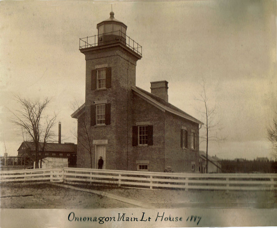 The lonely Ontonagon Lighthouse, under the cloudy skies of Lake Superior in 1877, when Albert Seward was ten years old.